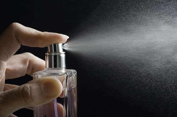 Spraying Perfume